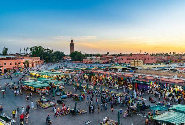 10 Days From Casablanca To Marrakech - Desert - Fes Shopping arcades on Jemaa el-Fna Marrakech market. Merchants sell various goods to tourists and locals.