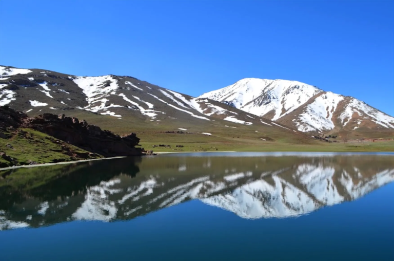 Snowy Atlas peaks reflected in a lake