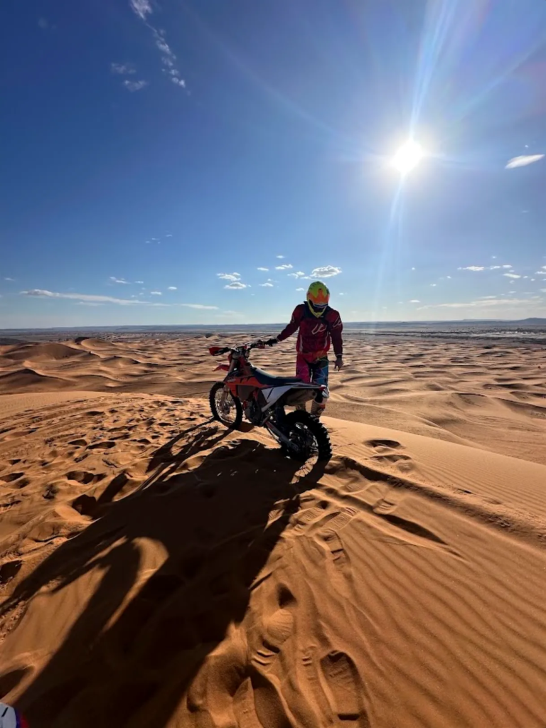 KTM enduro motorbike riding the Merzouga sand dunes
